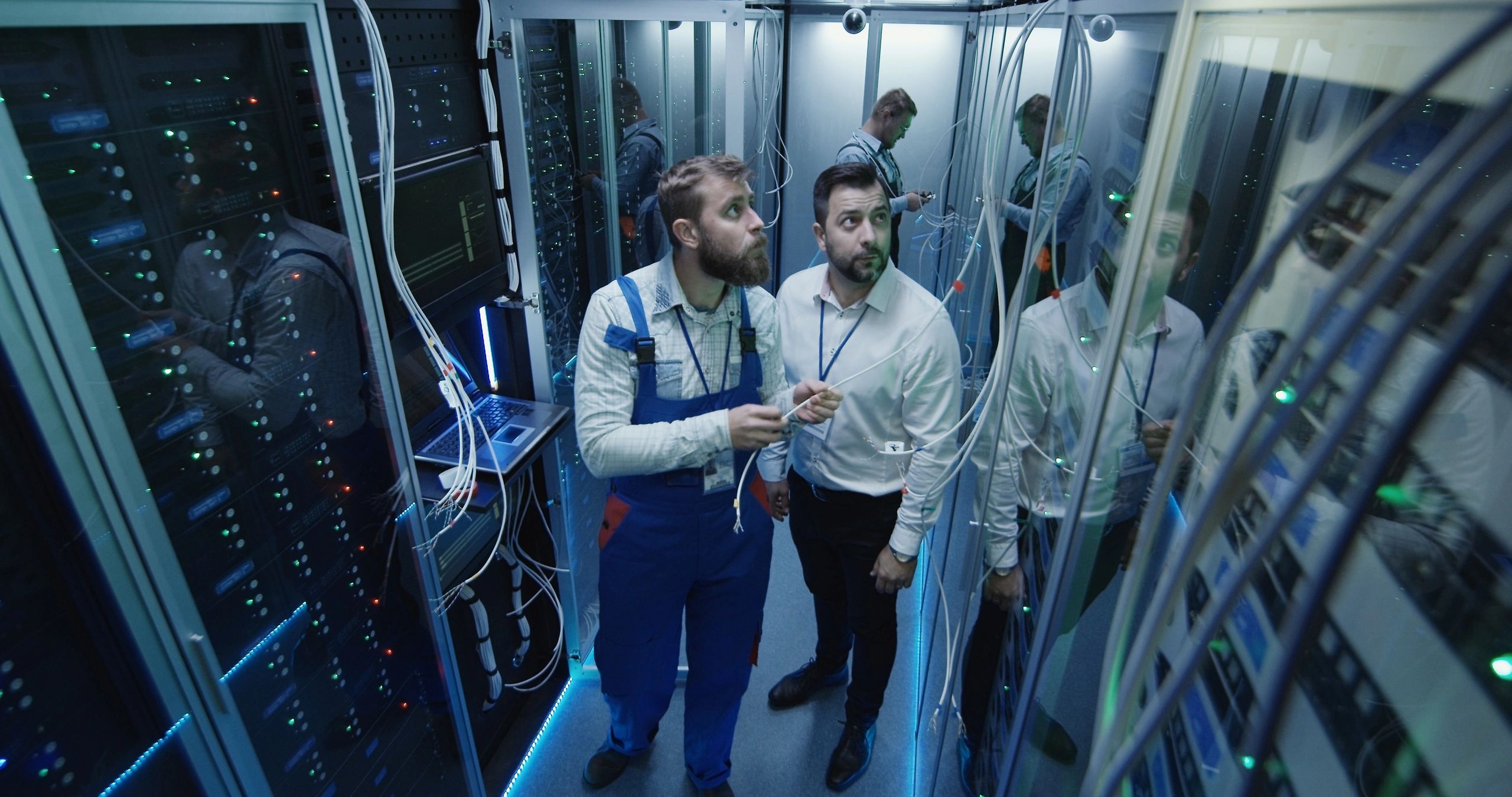 Team working in a data center server room